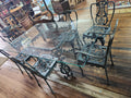 Ornate Cast-Iron Style Glass-Top Dining Table with 6 Chairs