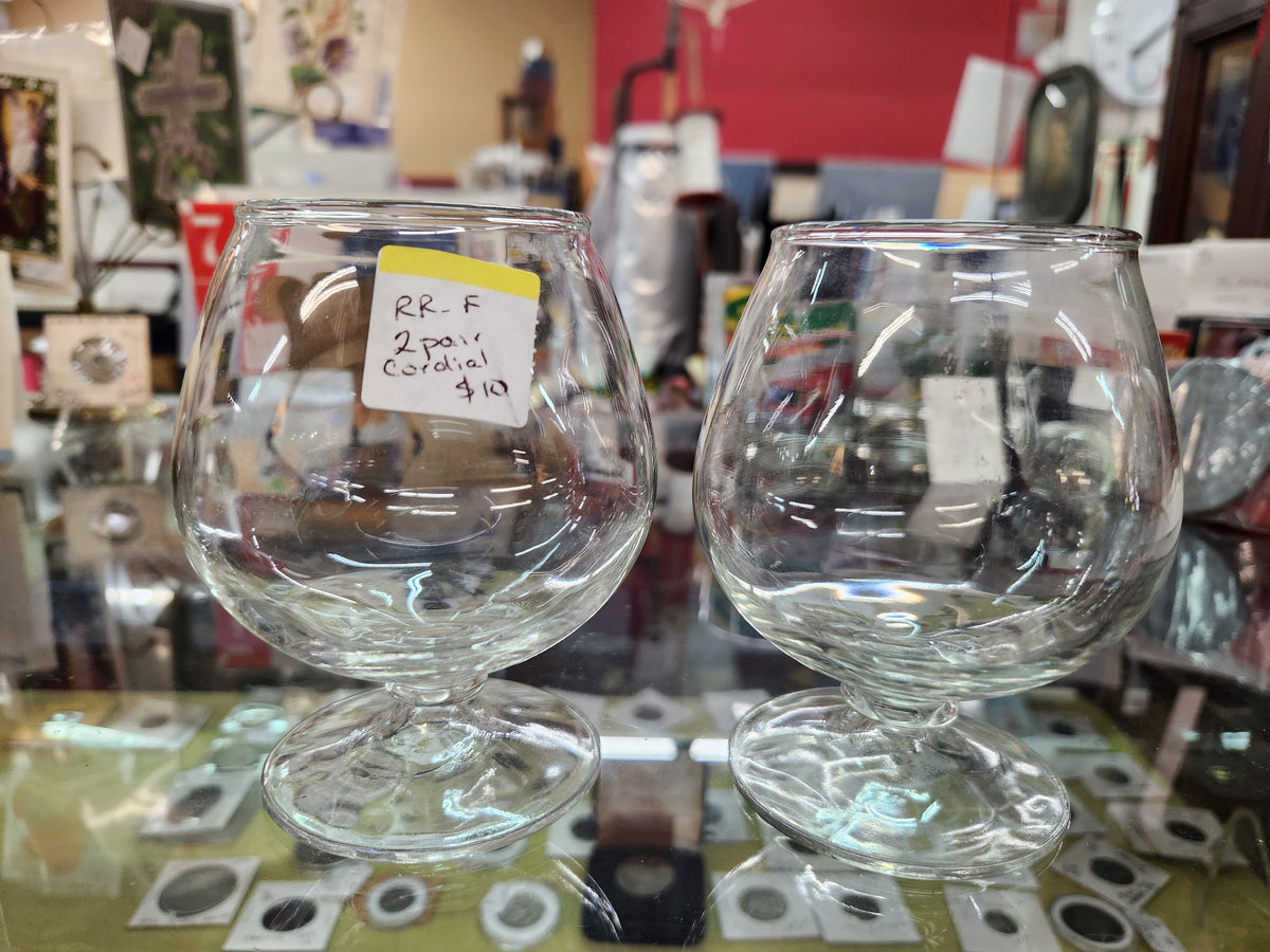 2 Clear Glass Brandy Snifters with a Short Stem and a Rounded, Bulbous Bowl