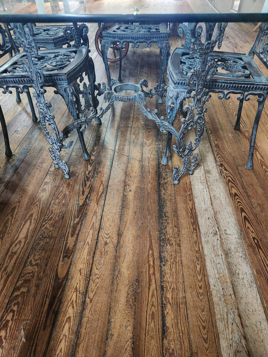 Ornate Cast-Iron Style Glass-Top Dining Table with 6 Chairs