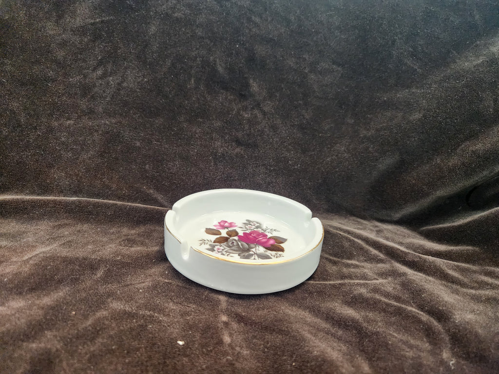 Vintage Porcelain Ashtray Featuring a Floral Center Design