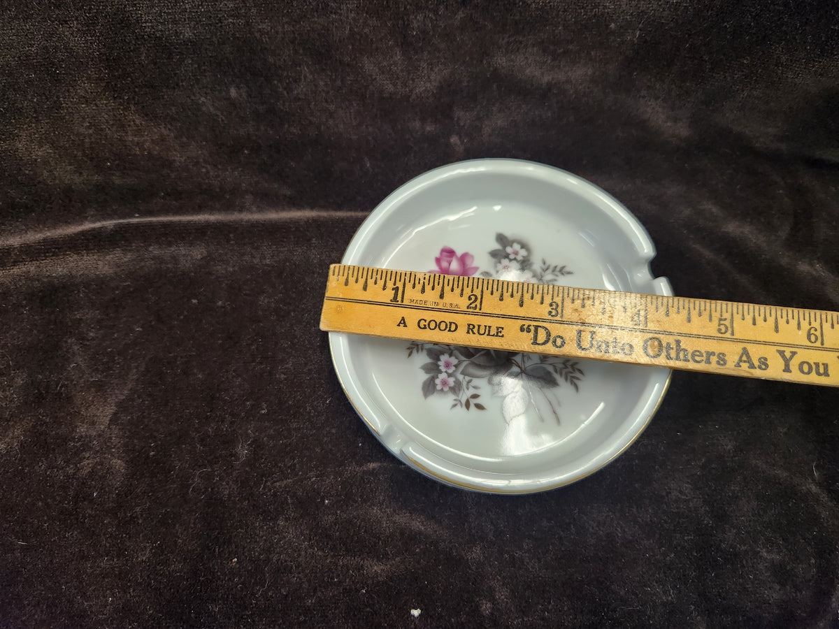 Vintage Porcelain Ashtray Featuring a Floral Center Design